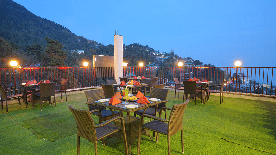 Image of the open air dining space at the resort | DLS Hotel Shiva Sanctuary and Spa